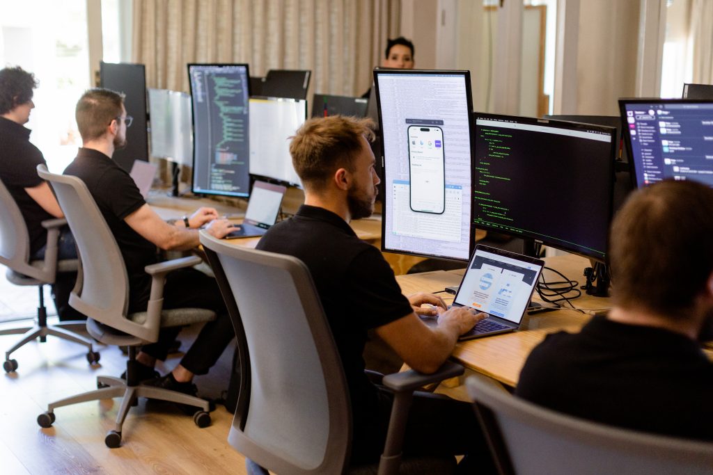 EPSza software development employees coding away